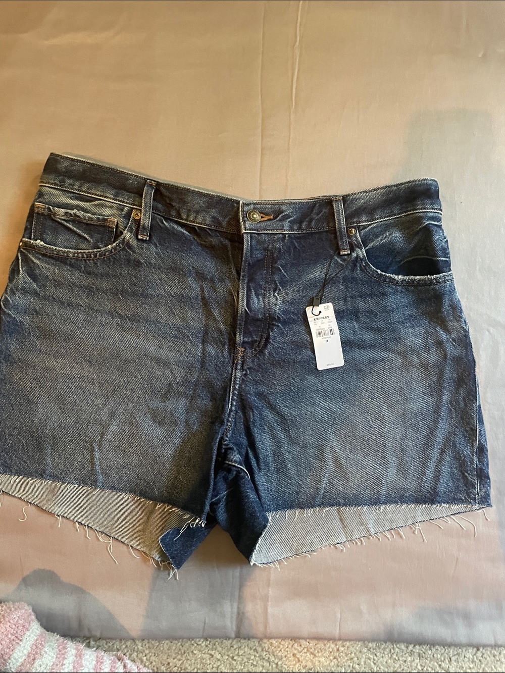 Express Dark Wash Denim Cutoff Shorts from Express. NWT